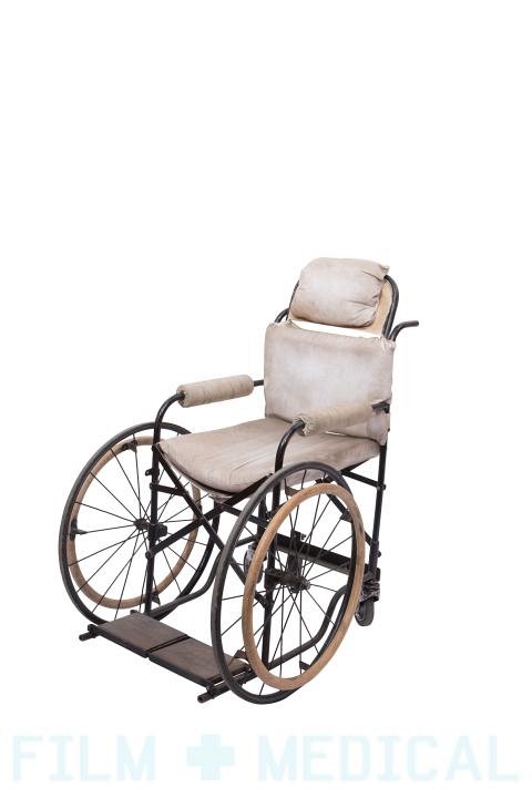 Period white fabric wheelchair